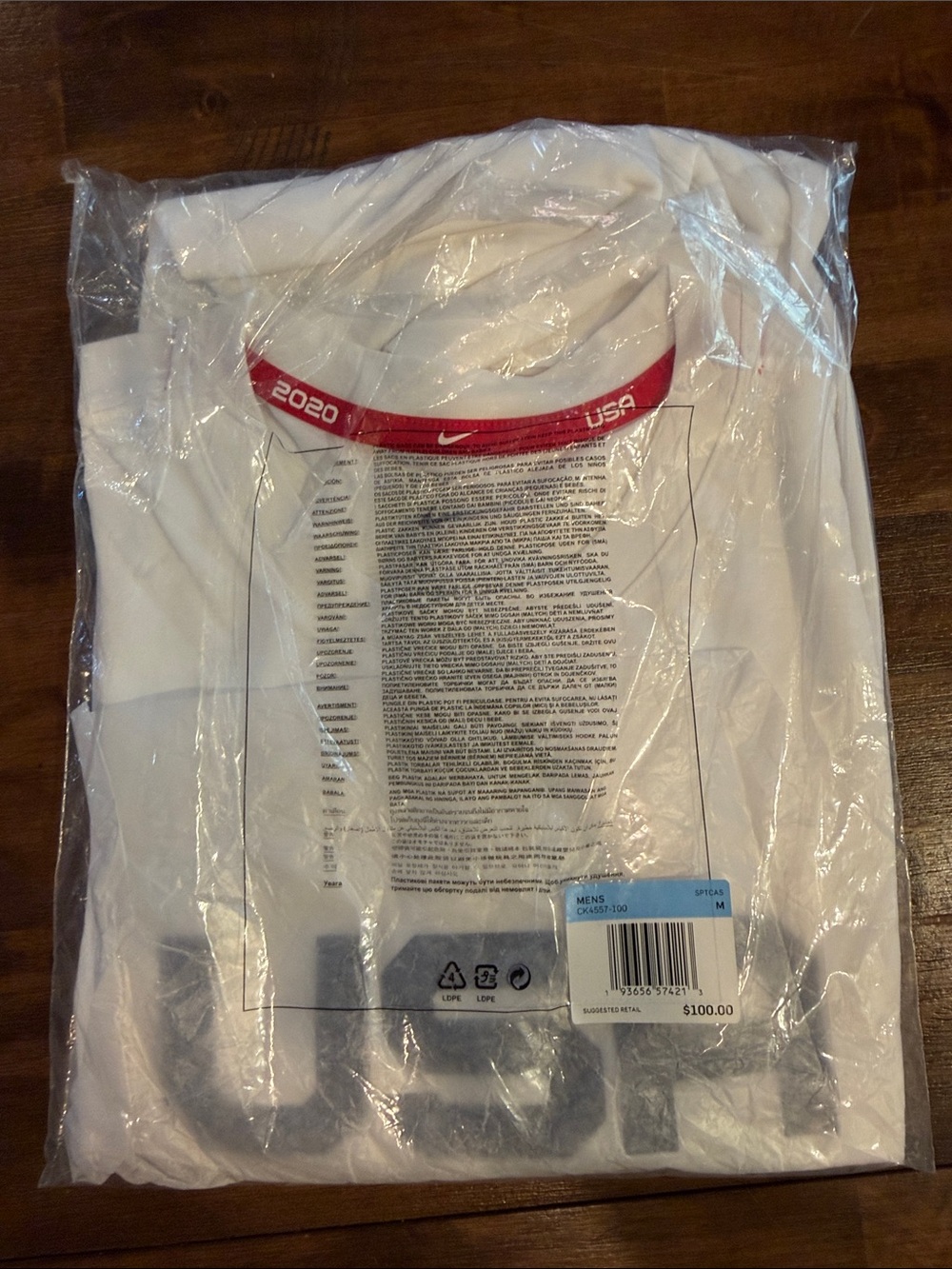 Nike White Tee with Red Neck Accent - Men's